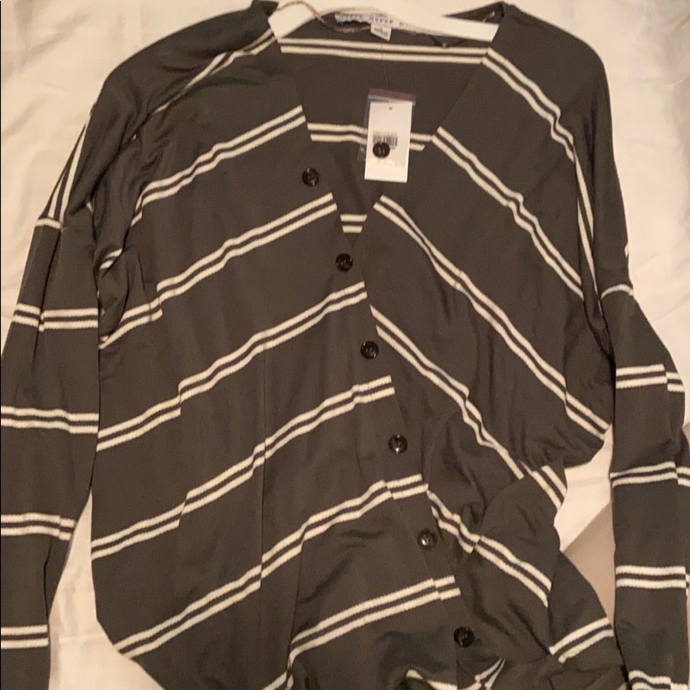 Green long sleeve shirt with white stripes